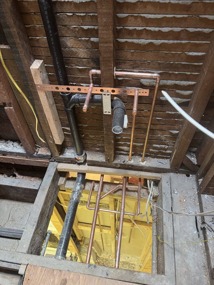 5Star Plumbing technician installing whole-house copper repiping in an Indianapolis attic